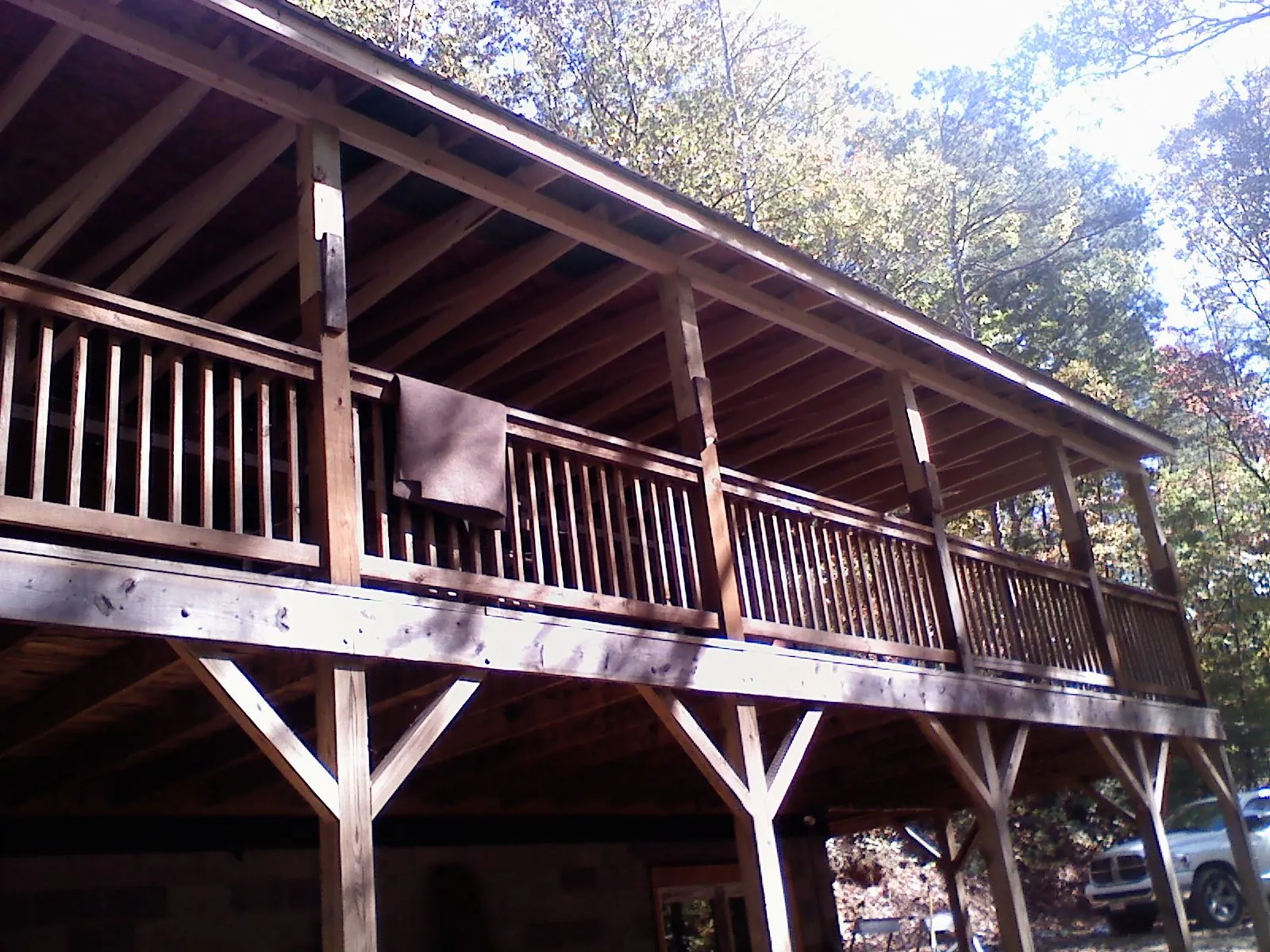 Timber framing under a new elevated porch and deck — Roof Leak Repair in New Berlinville by Roofing Brothers